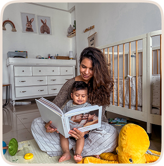 Mother and child reading a personalized baby photobook keepsake